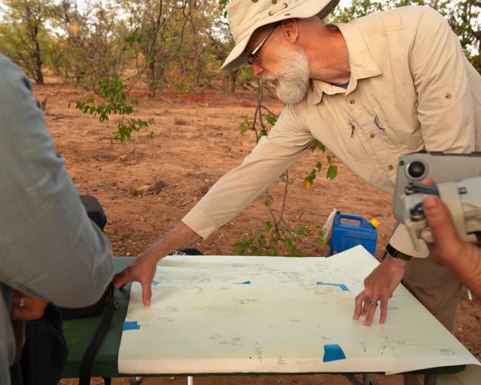 Christian E. Peterson, PhD, prepares a plane survey table for archaeological site mapping.